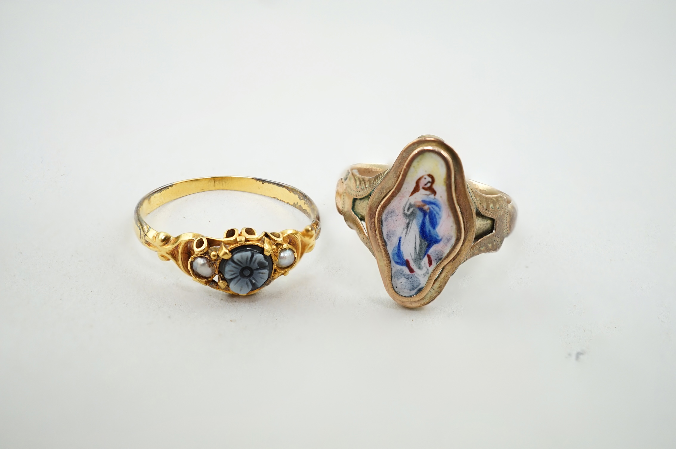 A Victorian gold, sardonyx and seed pearl set 'flower' ring, size N, together with a gold and enamel ring, decorated with a figure of a lady